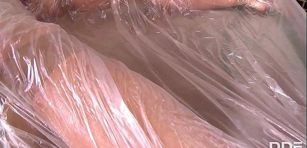  Submissive Leyla Black wraped in plastic and sticky tape for anal fetish
